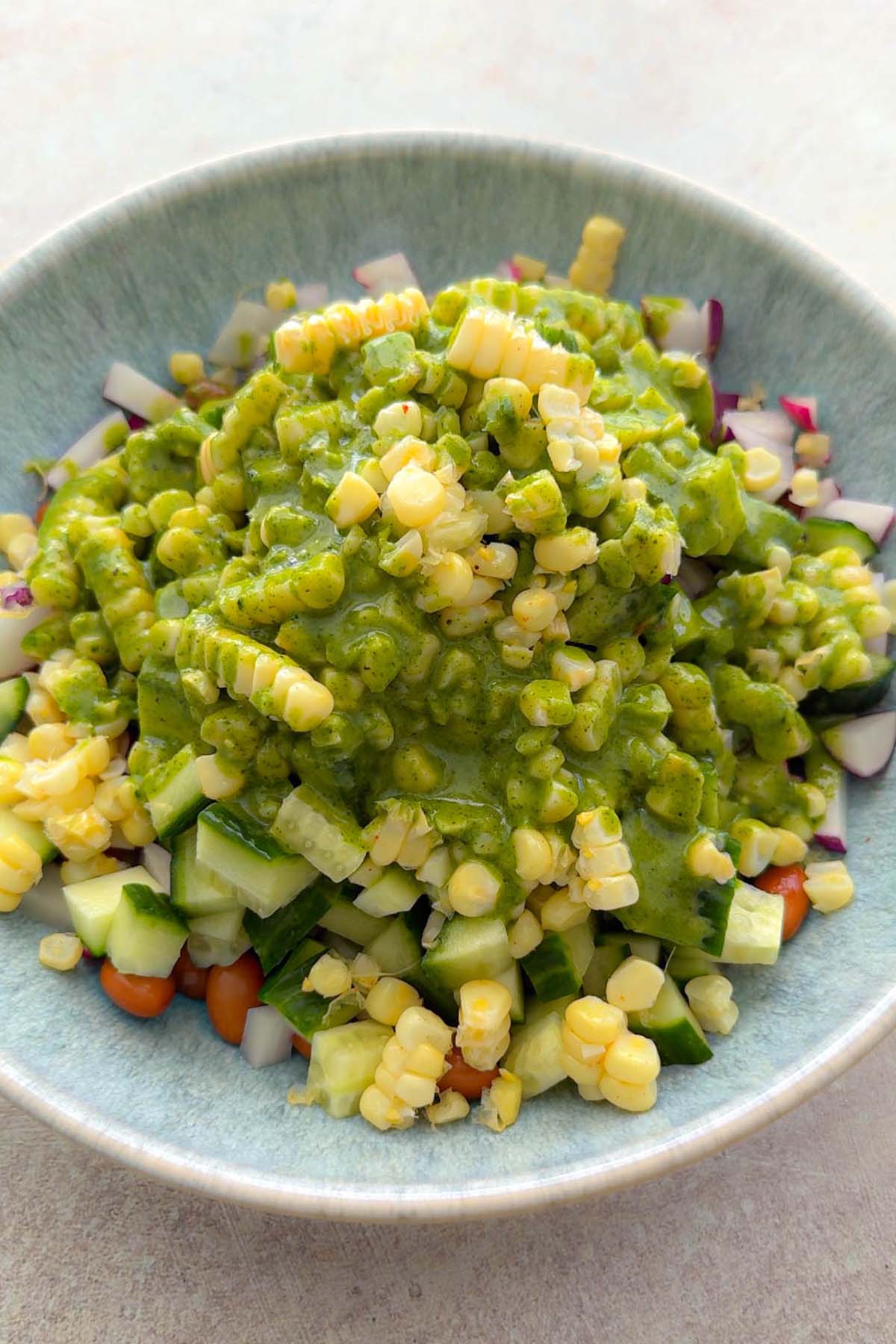 pint bean salad with tangy mint dressing drizzled