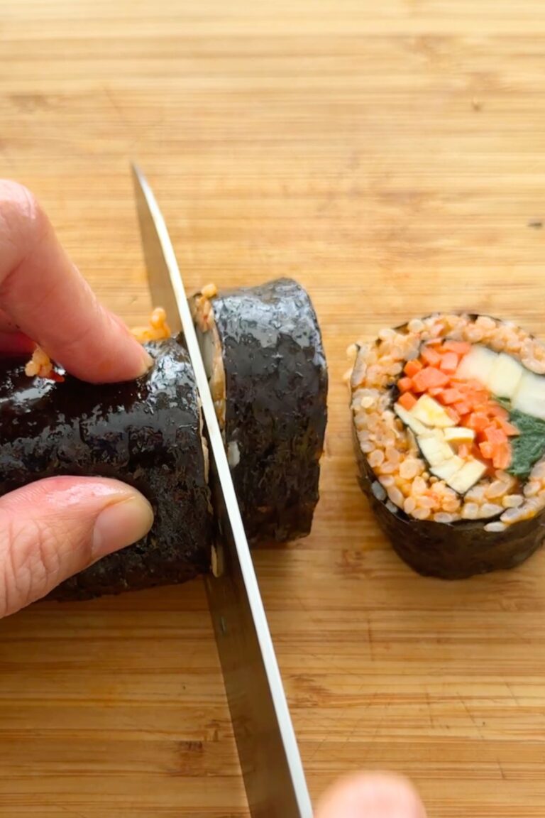 step by step instructions on how to roll a kimbap