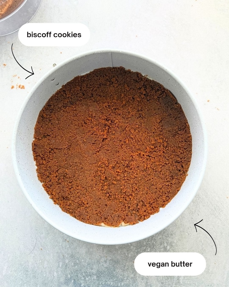 step 1 instruction on making vegan cheesecake vegan biscoff cheesecake crust ingredients with biscoff cookies and vegan butter