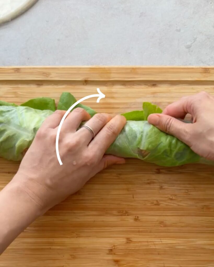 how to roll a spring roll step 3 roll the rice paper from bottom to top