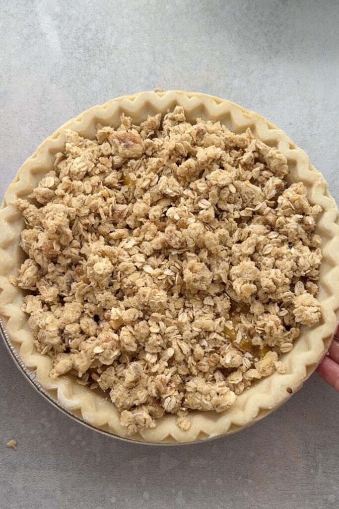 step 3 assemble the pie with pre-made pie crust for mango and canned peach pie