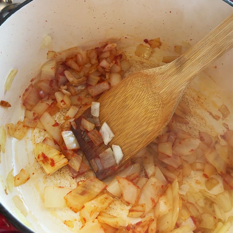 sauté onions in tomato paste