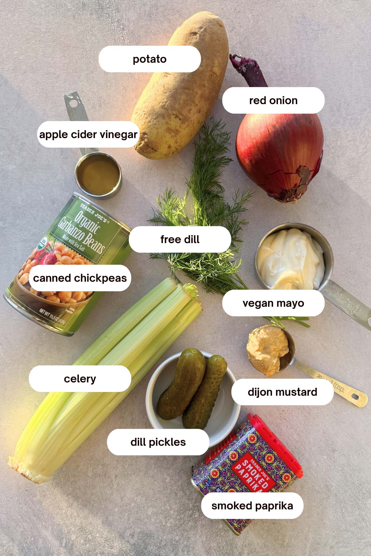 dairy free chickpea and potato salad recipe ingredients - vegan mayo, potato, chickpeas, apple cider vinegar, paprika, red onion, celery, dijon mustard, pickles